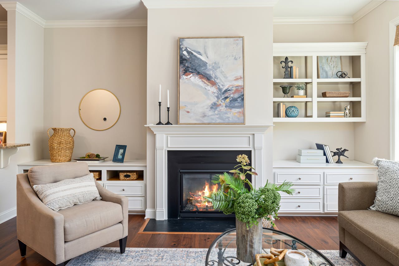creative-02 Elegant living room featuring a modern fireplace, art, and stylish furniture for a cozy ambiance.